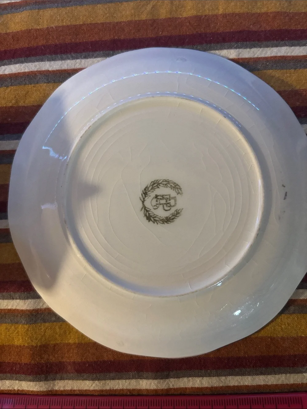 Green Porcelain Teacup and Saucer with Purple Floral Accents